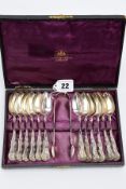 A CASED VICTORIAN TEASPOON SET, to include twelve teaspoons and a pair of sugar tongs, each of