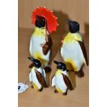 A BESWICK PENGUIN FAMILY, comprising Penguin with Umbrella no 802, Penguin with walking stick no 803