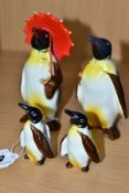 A BESWICK PENGUIN FAMILY, comprising Penguin with Umbrella no 802, Penguin with walking stick no 803