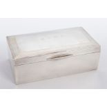 A SILVER LINED CIGARETTE BOX, of a plain polished design, engraved to the lid 'B.N.W.C.' within an