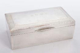 A SILVER LINED CIGARETTE BOX, of a plain polished design, engraved to the lid 'B.N.W.C.' within an