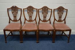 A SET OF FOUR MAHOGANY HEPPLEWHITE STYLE DINING CHAIRS with pink upholstered drop in seat pads