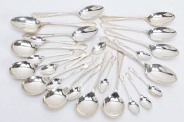 A SELECTION OF SILVER SPOONS, all of a reeded design to include six soup spoons, five tablespoons,