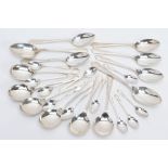 A SELECTION OF SILVER SPOONS, all of a reeded design to include six soup spoons, five tablespoons,