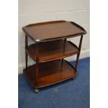 A DARK ERCOL ELM AND BEECH MODEL 458 THREE TIER TEA TROLLEY on orbit casters width 71cm x depth 46cm