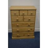A MODERN PINE CHEST OF EIGHT ASSORTED DRAWERS width 81cm x depth 45.5cm x height 109cm