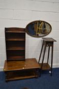 AN OAK COFFEE TABLE together with an oak open bookcase oak square topped torchere stand and an