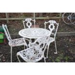 A CAST ALUMINIUM GARDEN TABLE AND FOUR MATCHING CHAIRS table 80cm in diameter