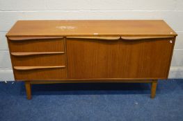 A MID TO LATE 20TH CENTURY TEAK SIDEBOARD flanked by three drawers width 153cm x depth 43cm x height