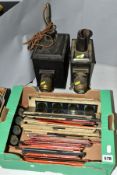 TWO TOY MAGIC LANTERNS, both japanned finish, together with a box of approximately eighty five