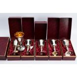 A SET OF SIX BOXED ELIZABETH II SILVER GOBLETS, gilt interiors, on conical stem to a circular