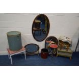 AN EDWARDIAN MAHOGANY OVAL BEVELLED EDGE WALL MIRROR together with a mahogany toilet mirror two