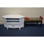A MODERN WHITE CORNER UNIT width 120cm together with a modern window seat with a leopard print