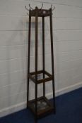 AN EARLY TO MID 20TH CENTURY OAK TAPERING SQURE HAT/COAT STAND with eight hooks and tin tray 41cm
