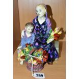 A ROYAL DOULTON FIGURE GROUP 'THE LITTLE MOTHER' HN1399, formerly known as The Young Widow, printed,