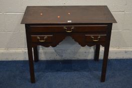 A REPRODUCTION OAK LOWBOY with a one long over two short drawers width 86cm x depth 43cm x height