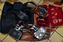 A BOX OF CASED CAMERAS AND MOVIE CAMERAS, ETC, including an Olympus OM-2SP camera with OM system