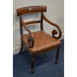 A VICTORIAN MAHOGANY BAR BACK ARMCHAIR, with brown buttoned leather upholstery with scrolled arms