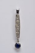 A WHITE METAL DIAMOND AND SAPPHIRE PENDANT, designed with a curved elongated rectangular drop set