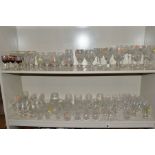 A QUANTITY OF CUT GLASS DRINKING GLASSES, ETC, to include brandy, whisky, wine, sherry and port