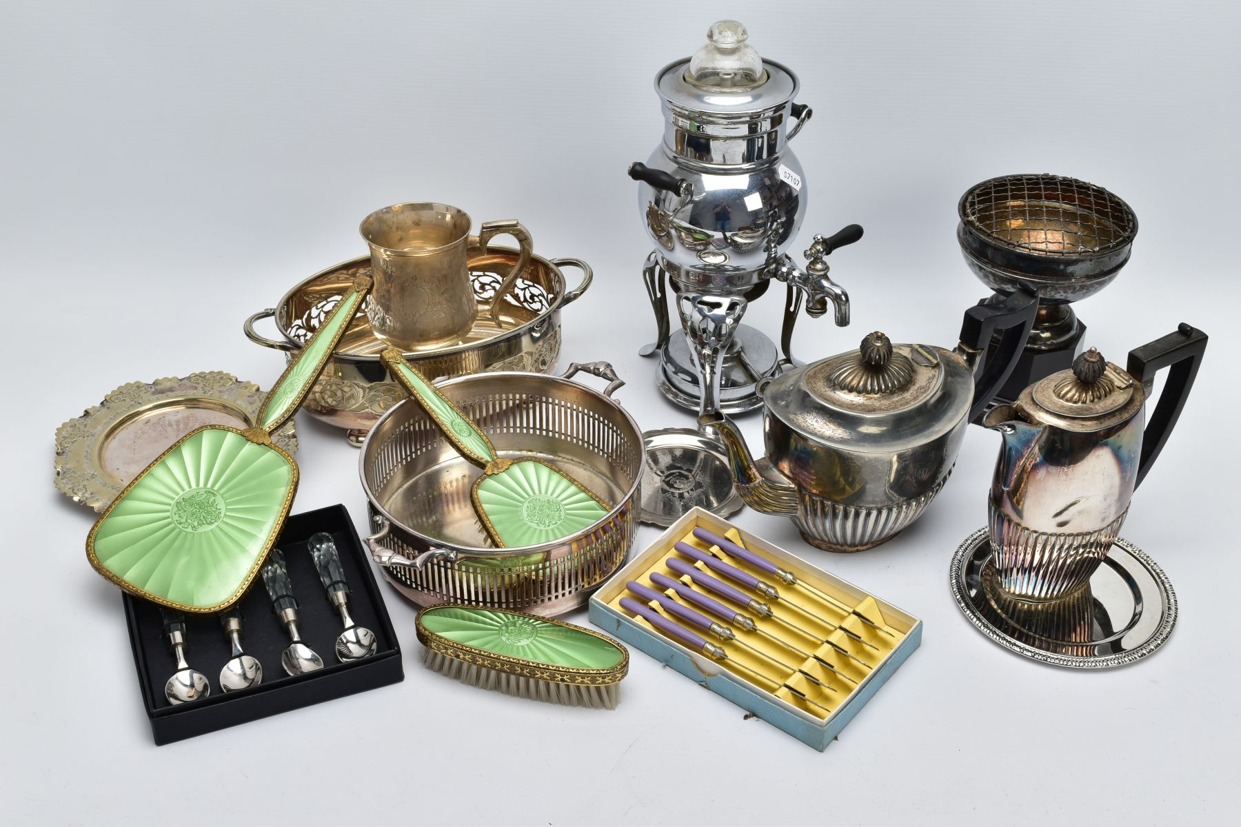 A BOX OF METALWARE, to include a three piece vanity set of a hair brush, mirror and clothes brush of