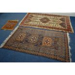 A 20TH CENTURY WOOLLEN KAZAK RUG, red and cream field, 209cm x 126cm together with another rug,