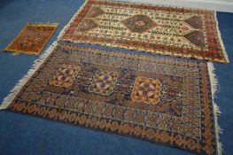 A 20TH CENTURY WOOLLEN KAZAK RUG, red and cream field, 209cm x 126cm together with another rug,