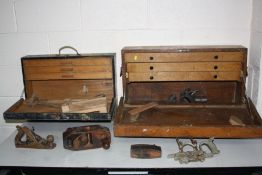 TWO VINTAGE WOODEN CARPENTER TOOLBOXES including one oak box , a dowel plane, a Record no 50