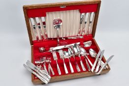 A COMPLETE CANTEEN OF CUTLERY, the light wooden box opens to reveal a complete set of 'Community'