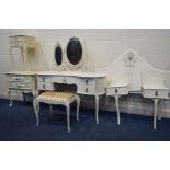 A MATCHED CREAM AND GILT BEDROOM SUITE, to include a kidney dressing table with a triple dressing
