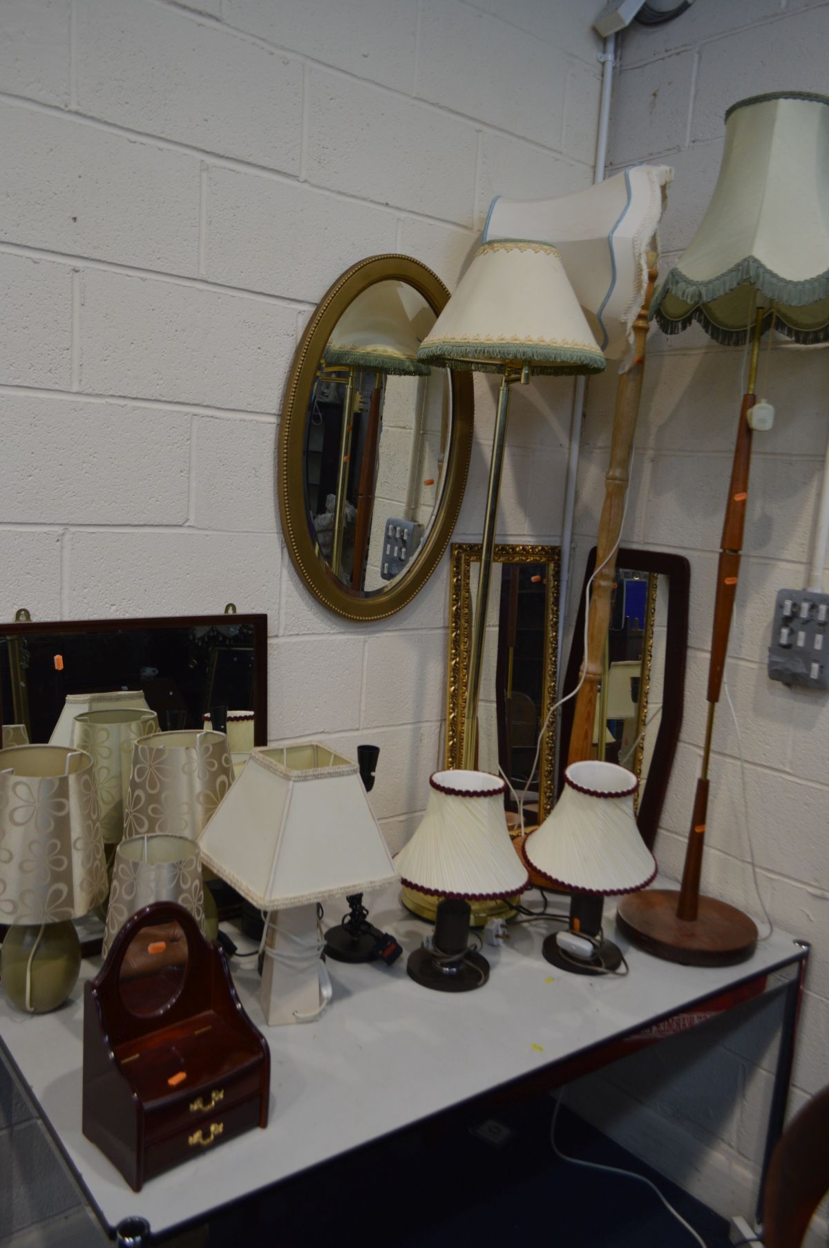 THREE VARIOUS STANDARD LAMPS, including a retro teak lamp, together with an nine various modern