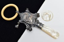 A SILVER AND MOTHER OF PEARL BABYS RATTLE, silver body depicting 'The Cow Jumped Over The Moon'