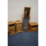 A MATCHED PAIR OF PINE BEDSIDE CABINETS, together with a pine cheval mirror and tv stand (4)