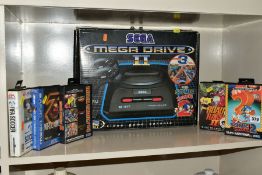 SEGA MEGA DRIVE II COMPLETE WITH TWO CONTROLLERS, POWER PACK AND SEGA RF UNIT, together with Sonic