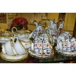 A CONTINENTAL PORCELAIN COFFEE SET, hand painted floral decoration between gilt and silver lustre