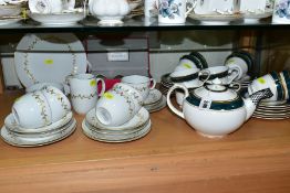 A ROYAL DOULTON BILTMORE PATTERN TEA SET, comprising tea pot, ten cups, nine saucers and ten tea