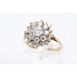 A MODERN 9CT GOLD ROUND CLUSTER CUBIC ZIRCONIA RING, ring size R½, hallmarked 9ct gold,