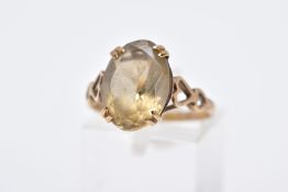 A 9CT GOLD CITRINE SINGLE STONE RING, measuring approximately 14.0mm x 10.0mm, ring size O,