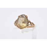 A 9CT GOLD CITRINE SINGLE STONE RING, measuring approximately 14.0mm x 10.0mm, ring size O,