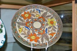 A CHARLOTTE RHEAD FOR CROWN DUCAL CHARGER, tube line decorated in the 5983 Ankara pattern, painted