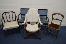 A 20TH CENTURY SAVONAROLA OPEN ARMCHAIR with white floral upholstery, (this armchair does not comply