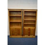 A PAIR OF MODERN PINE OPEN BOOKCASES, each with two adjustable shelves, above double panelled