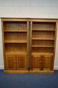 A PAIR OF MODERN PINE OPEN BOOKCASES, each with two adjustable shelves, above double panelled