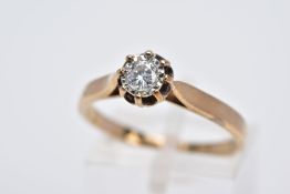 A 9CT GOLD SINGLE STONE DIAMOND RING, designed with an illusion set round brilliant cut diamond