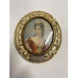AN EARLY 19TH CENTURY CARVED IVORY MINIATURE PORTRAIT HAND HELD MIRROR, of an oval form, decorated