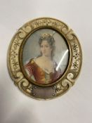 AN EARLY 19TH CENTURY CARVED IVORY MINIATURE PORTRAIT HAND HELD MIRROR, of an oval form, decorated