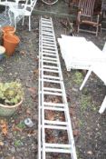 A YOUNGMAN MERCURY ALUMINIUM EXTENSION LADDER each section is 4m long with 15 rungs