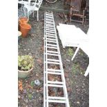 A YOUNGMAN MERCURY ALUMINIUM EXTENSION LADDER each section is 4m long with 15 rungs