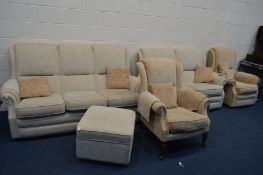 A FIVE PIECE OATMEAL/PALE ORANGE LOUNGE SUITE, comprising three seater and a two seater settee,