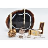 A BOX OF MISCELLANEOUS ITEMS, to include a brown and white banded agate slice, a mother of pearl